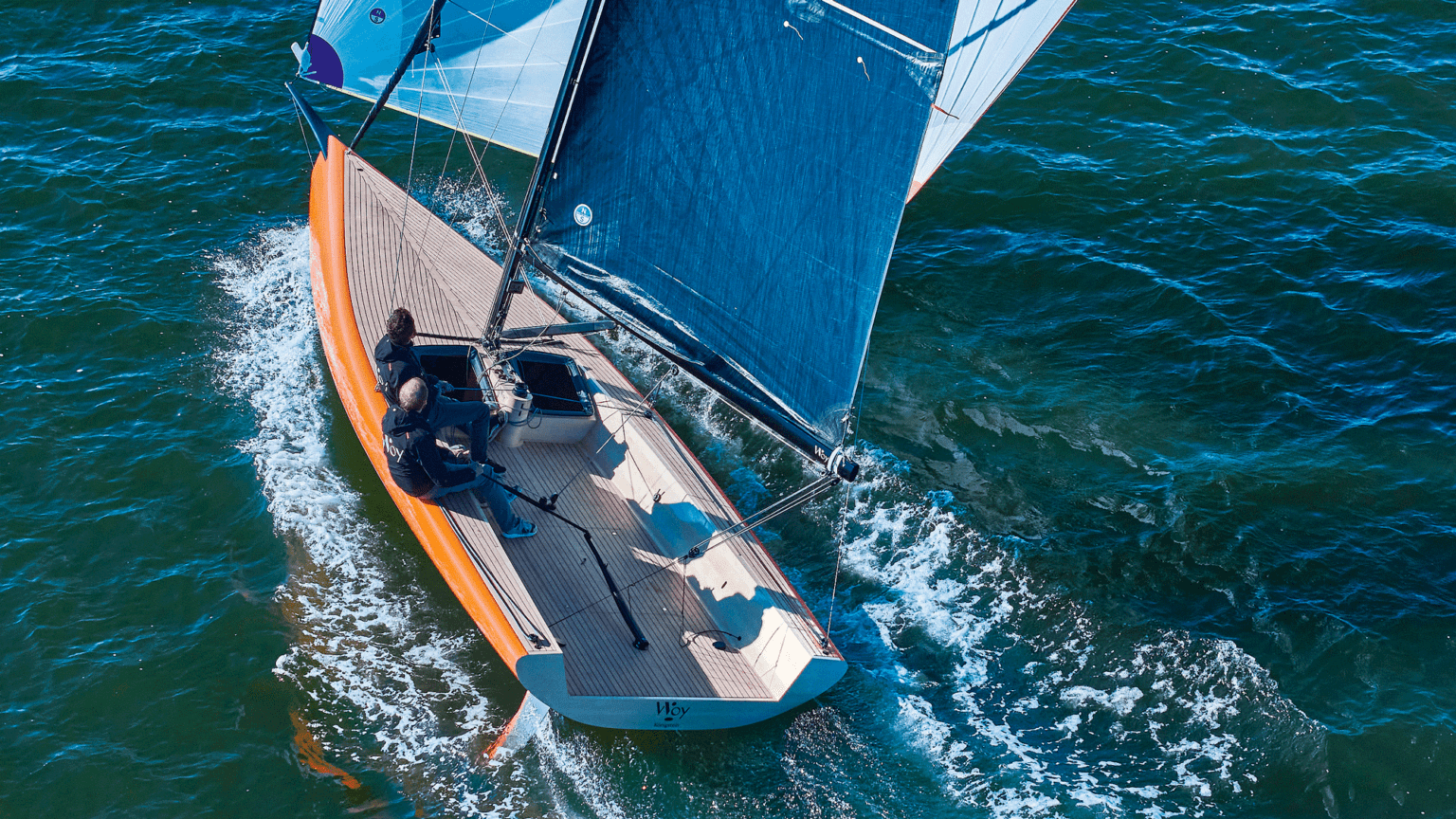 Aerial view of the Woy 26, a high-performance sustainable daysailer built with vacuum-infused timber and bio-resin construction